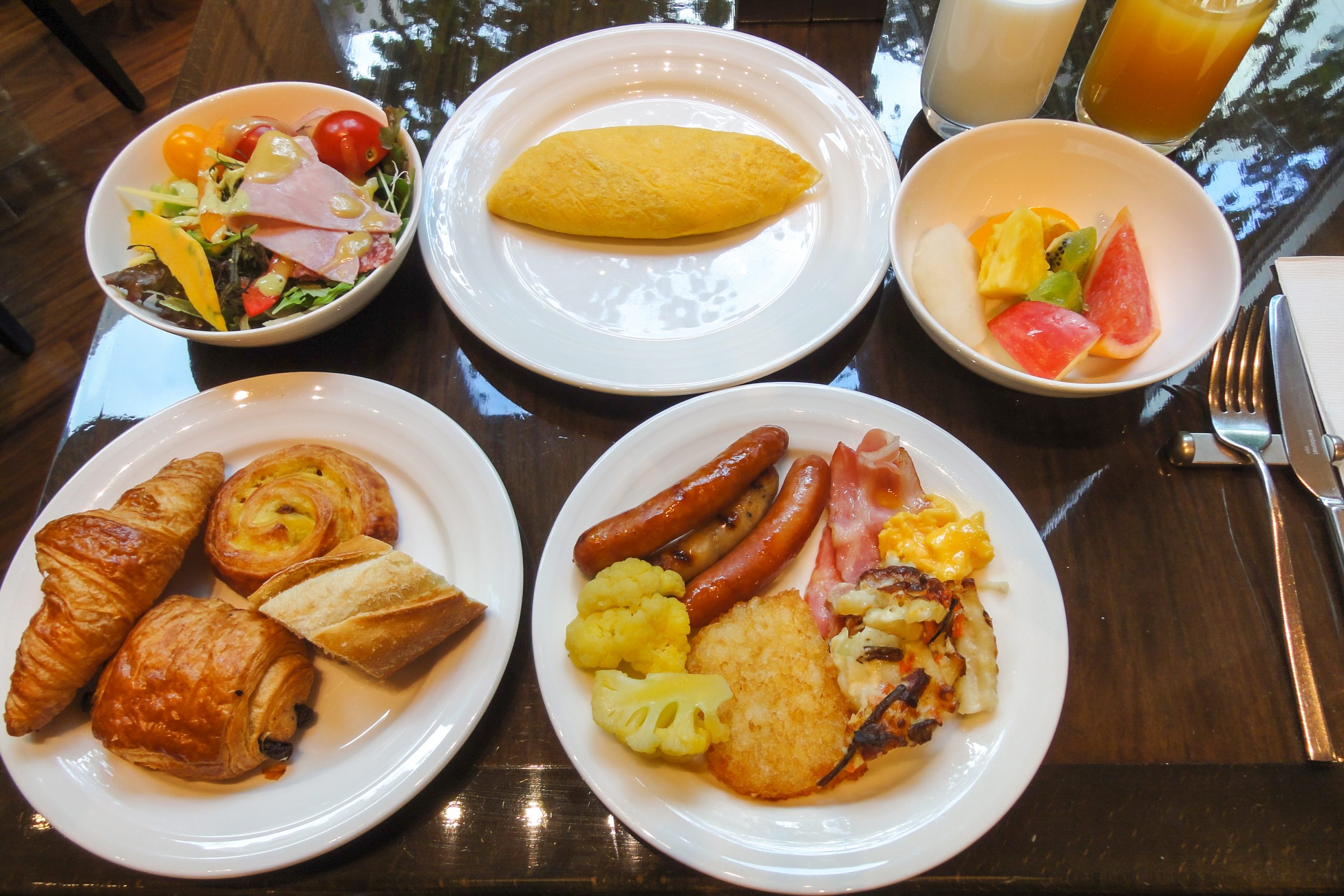 Plates of breakfast foods