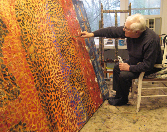 Eduardo working on large painting